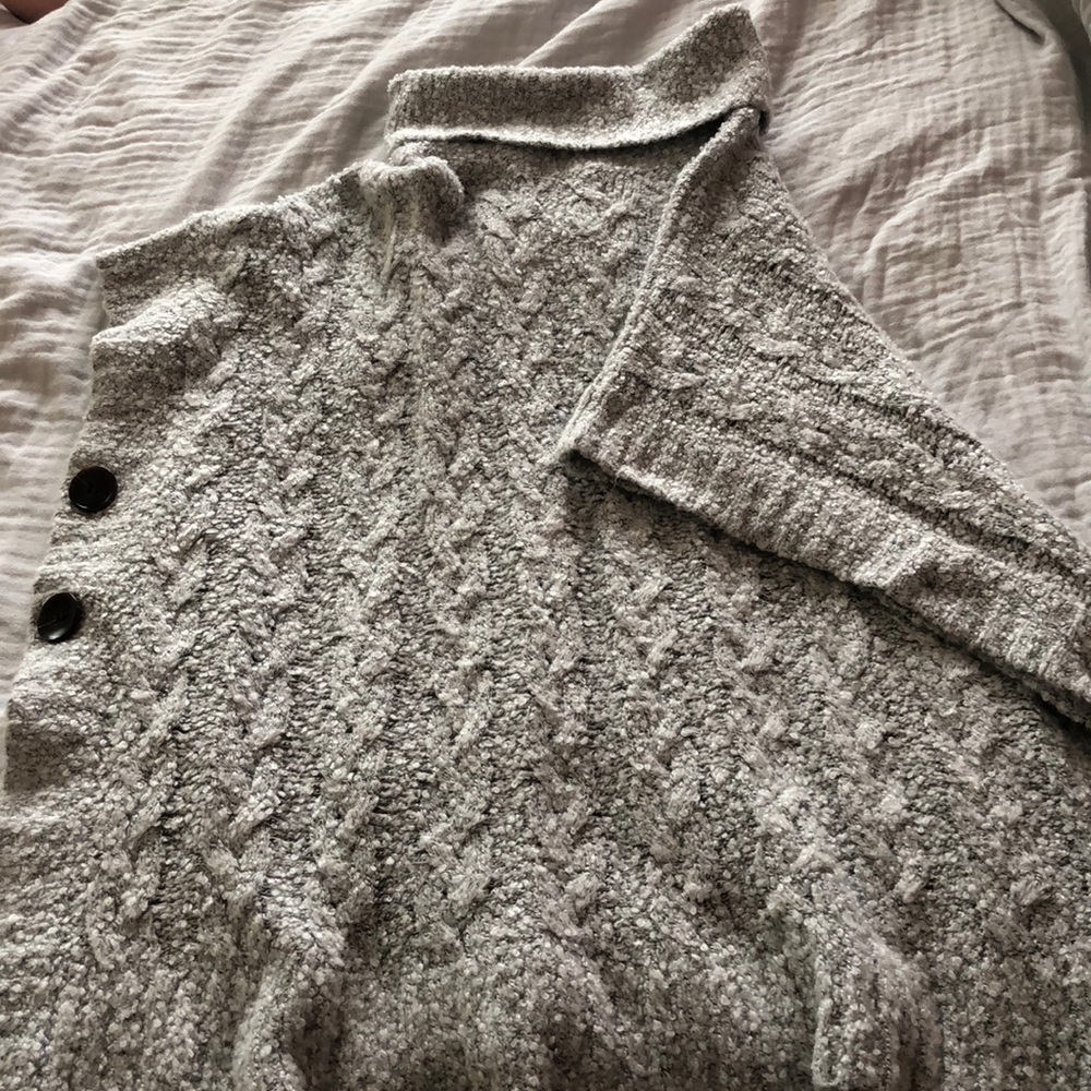 Grey poncho w/ black buttons & turtle neck